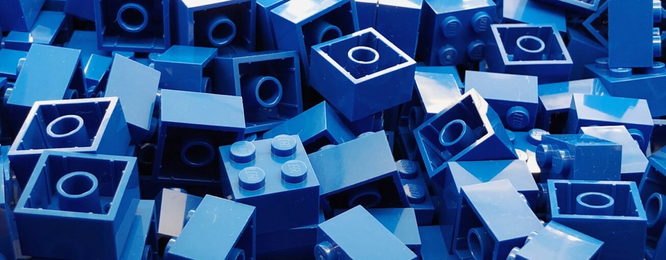 blue cube toy lot close-up photography