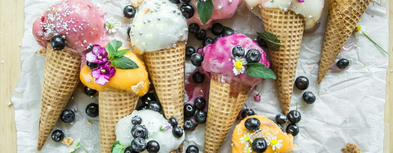 coned ice cream with blueberries and flowers